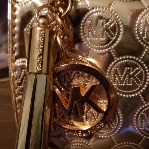 Michael Kors Metallic Logo Embossed Clutch Bag - Picture 2 of 8